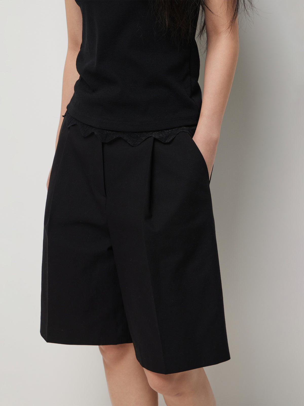 Bermuda shorts with pleats