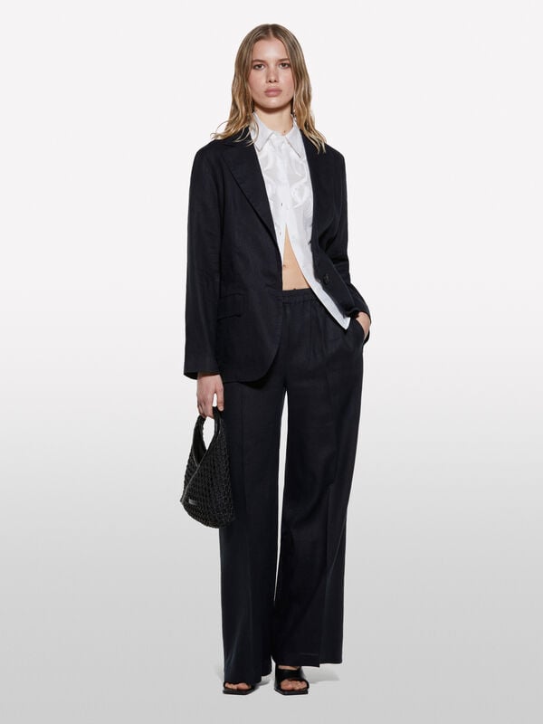 Calças pretas flare fit em 100% linho - calças palazzo para mulher | Sisley
