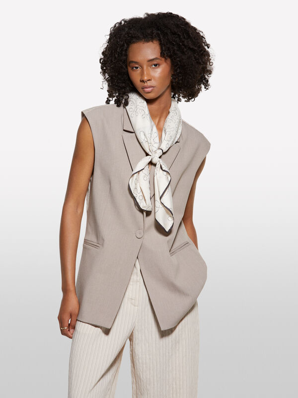 Colete bege com contraste riscado - coletes para mulher | Sisley