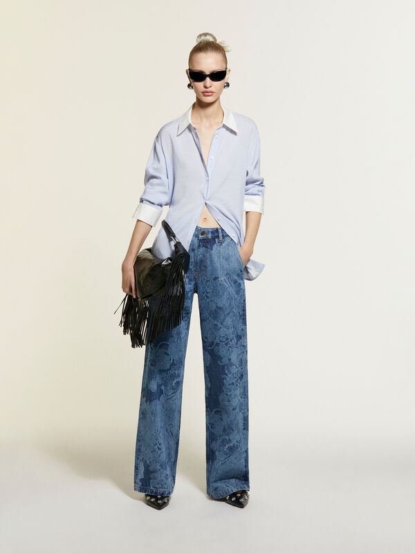 Camisa comfort azul-claro às riscas Camisa comfort azul-claro às riscas - camisas para mulher | Sisley