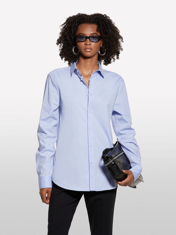 Camisa slim fit azul-claro Camisa slim fit azul-claro - camisas para mulher | Sisley
