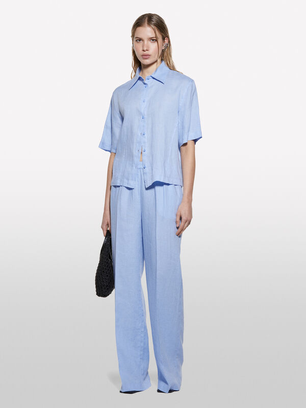 Calças azul-claro flare fit em 100% linho - calças palazzo para mulher | Sisley