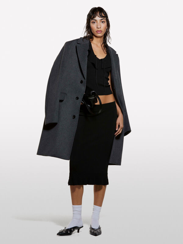 Saia preta de malha com folhos - saias midi, longuette mulher | Sisley